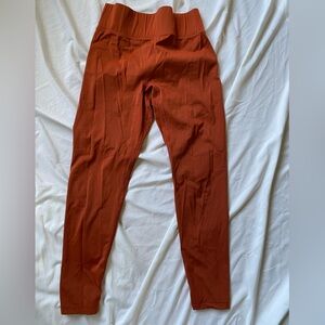 Burnt orange all access size medium 7/8 leggings with seamless front